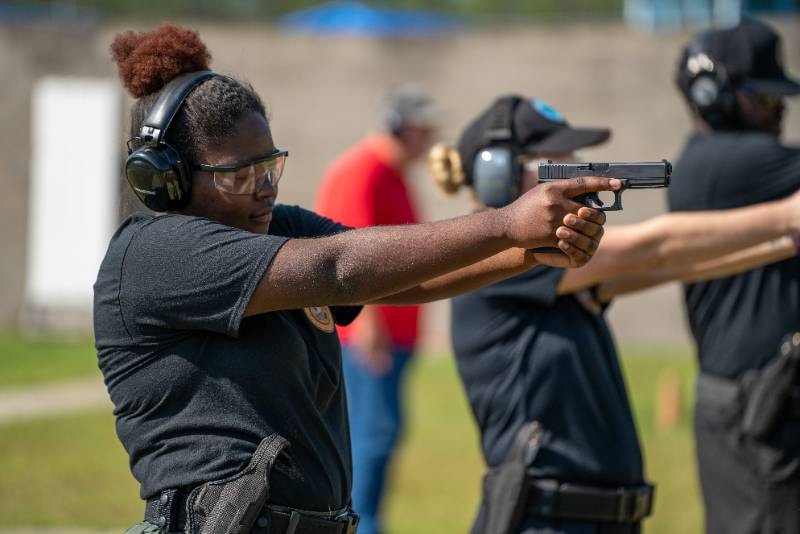 Students at an outdoor shooting range